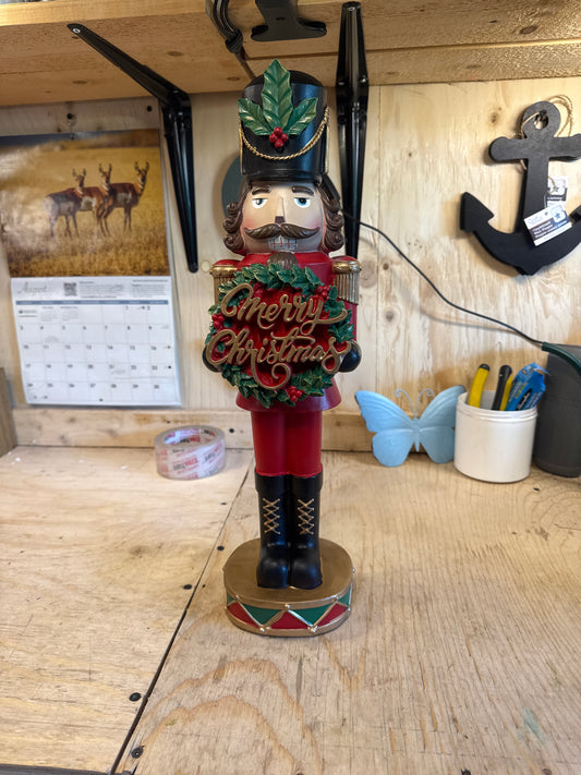 Nutcracker W/ "Merry Christmas" Wreath